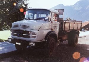 Schmid Bau Geschichte Lastwagen mir Fahrer Mark